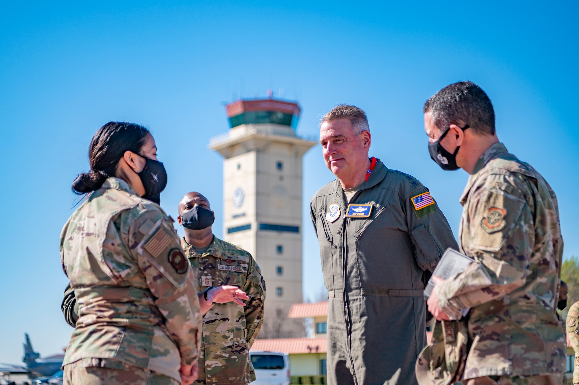 Airman greets visitors