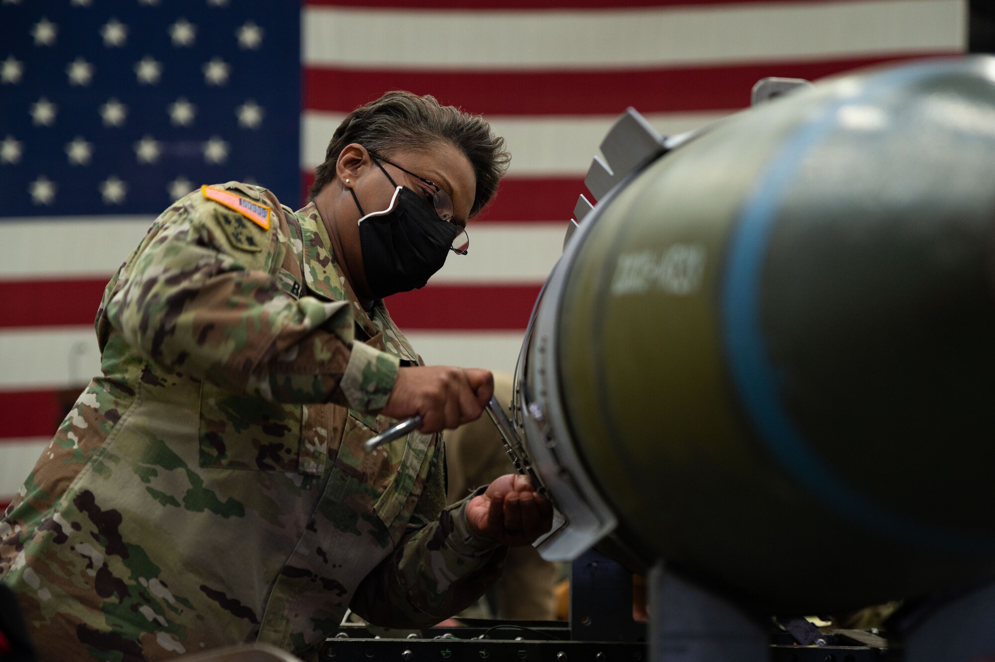 Brig. Gen. Felicia Brokaw, United States Forces Korea J-4 (Wartime) assistant chief of staff, assembles a guided bomb unit during Airpower Immersion Day at Osan Air Base, Republic of Korea, February 11, 2022. The event enabled leadership to see how multiple missions on base play a vital role in air component readiness. (U.S. Air Force photo by Senior Airman Megan Estrada)