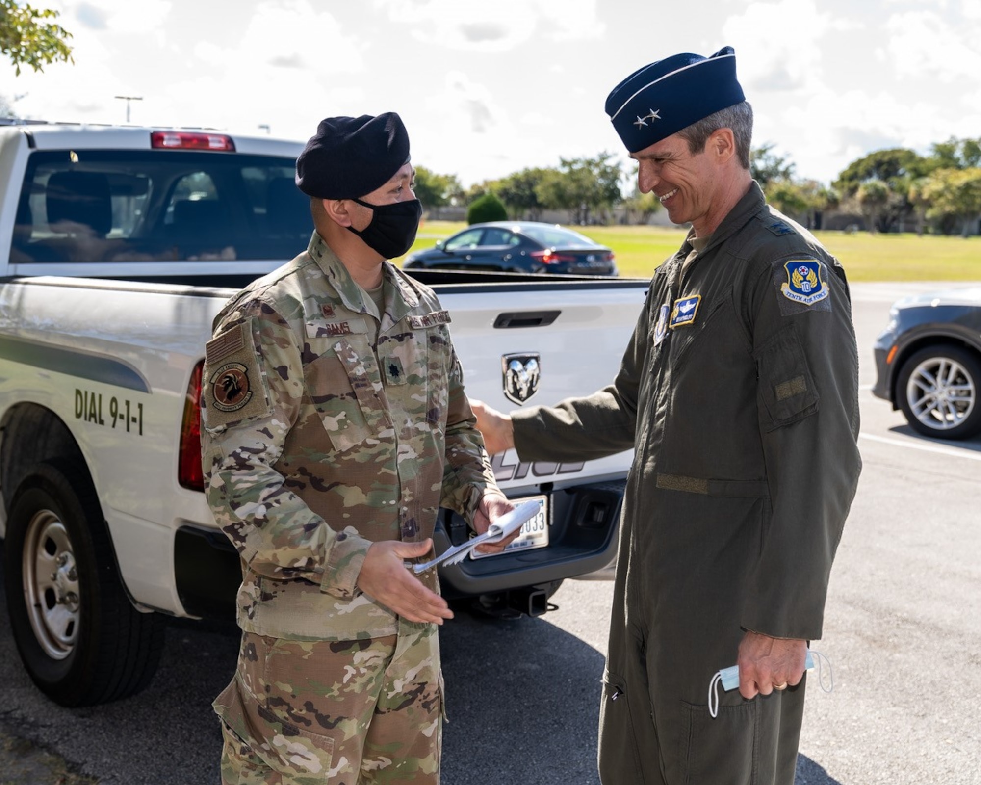 Lt. Col. James Sams, 482nd Security Forces Squadron commander, meets with Maj. Gen. Bryan Radliff, 10th Air Force commander, during a base tour at Homestead Air Reserve Base, Florida, Feb. 7, 2022. Radliff saw some of the new equipment and technology that the base defenders train with and use. (U.S. Air Force photo by Tech. Sgt. Lionel Castellano)