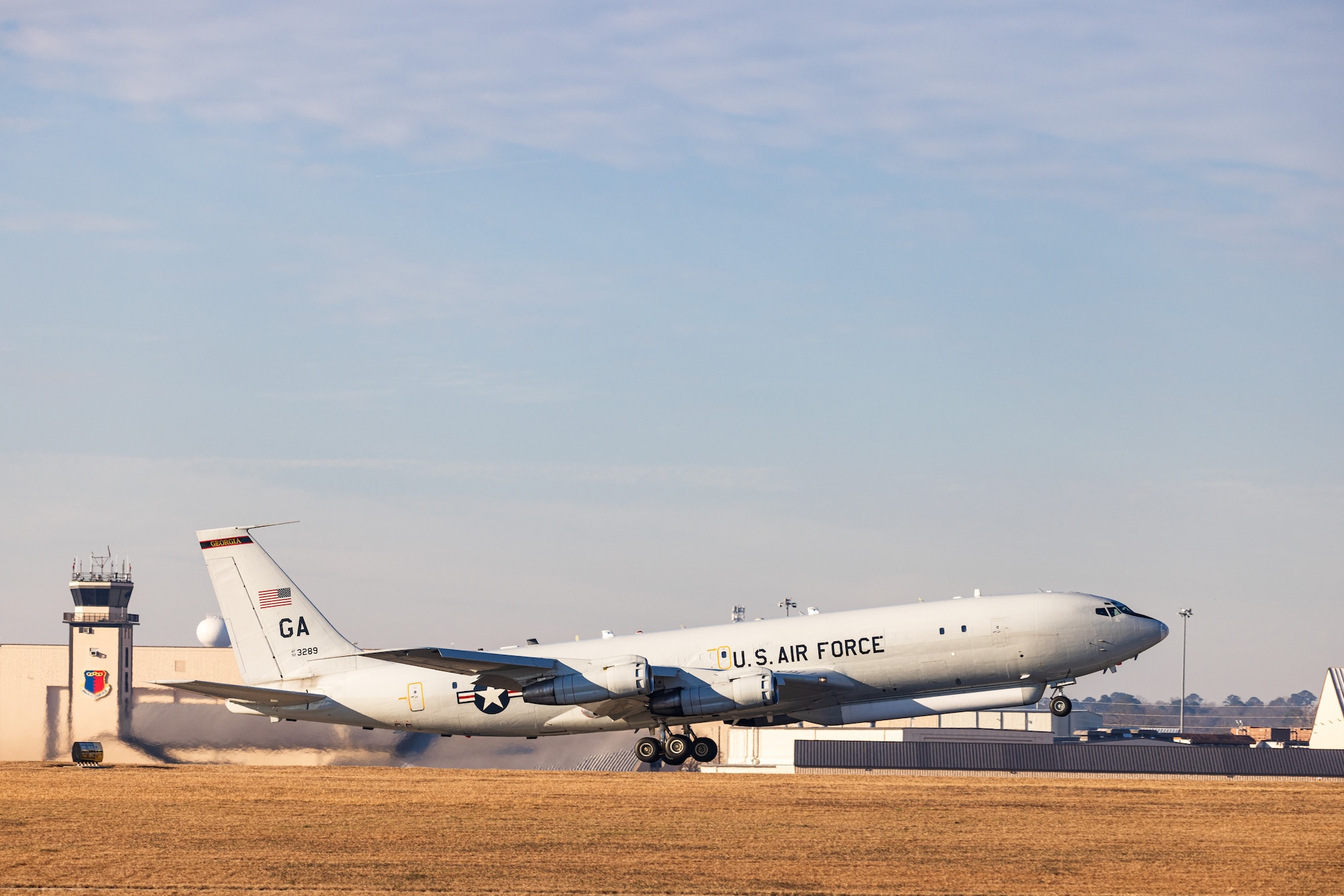 E-8C Joint STARS aircraft 92-3289 departs one last time from Robins Air Force Base, Georgia, Feb. 11, 2022. The aircraft has been in military service since 1996 and will retire to its final resting place with the 309th Aerospace Maintenance and Regeneration Group at Davis-Monthan Air Force Base, Arizona. (U.S. Air National Guard photo by Tech. Sgt. Jeff Rice)