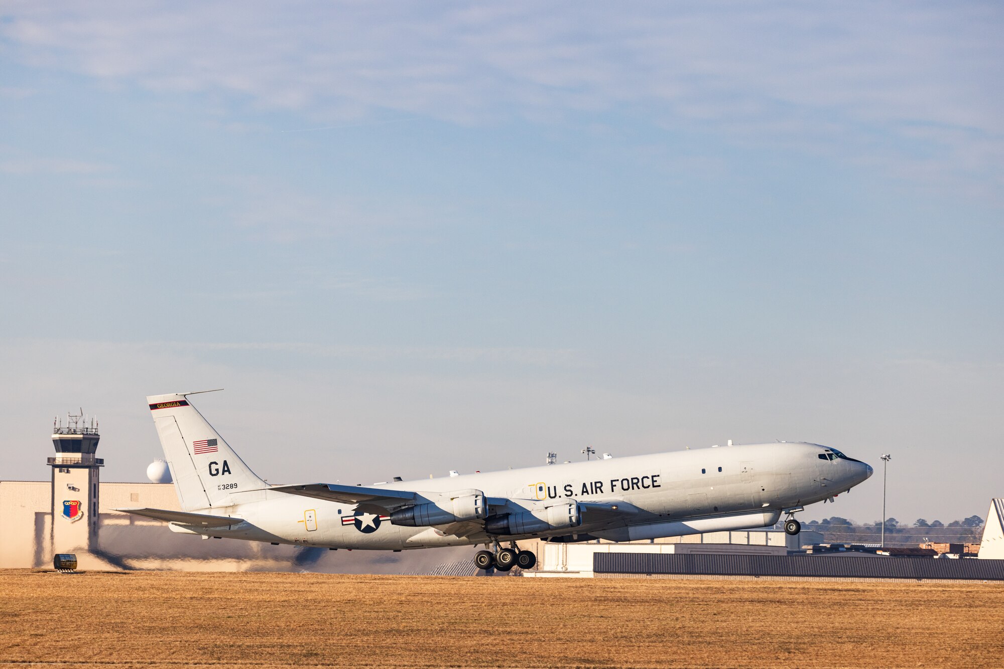 E-8C Joint STARS aircraft 92-3289 departs one last time from Robins Air Force Base, Georgia, Feb. 11, 2022. The aircraft has been in military service since 1996 and will retire to its final resting place with the 309th Aerospace Maintenance and Regeneration Group at Davis-Monthan Air Force Base, Arizona. (U.S. Air National Guard photo by Tech. Sgt. Jeff Rice)
