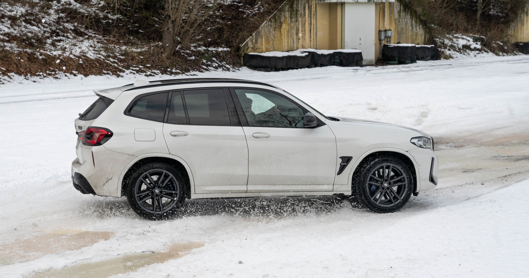 A vehicle driving in snow.