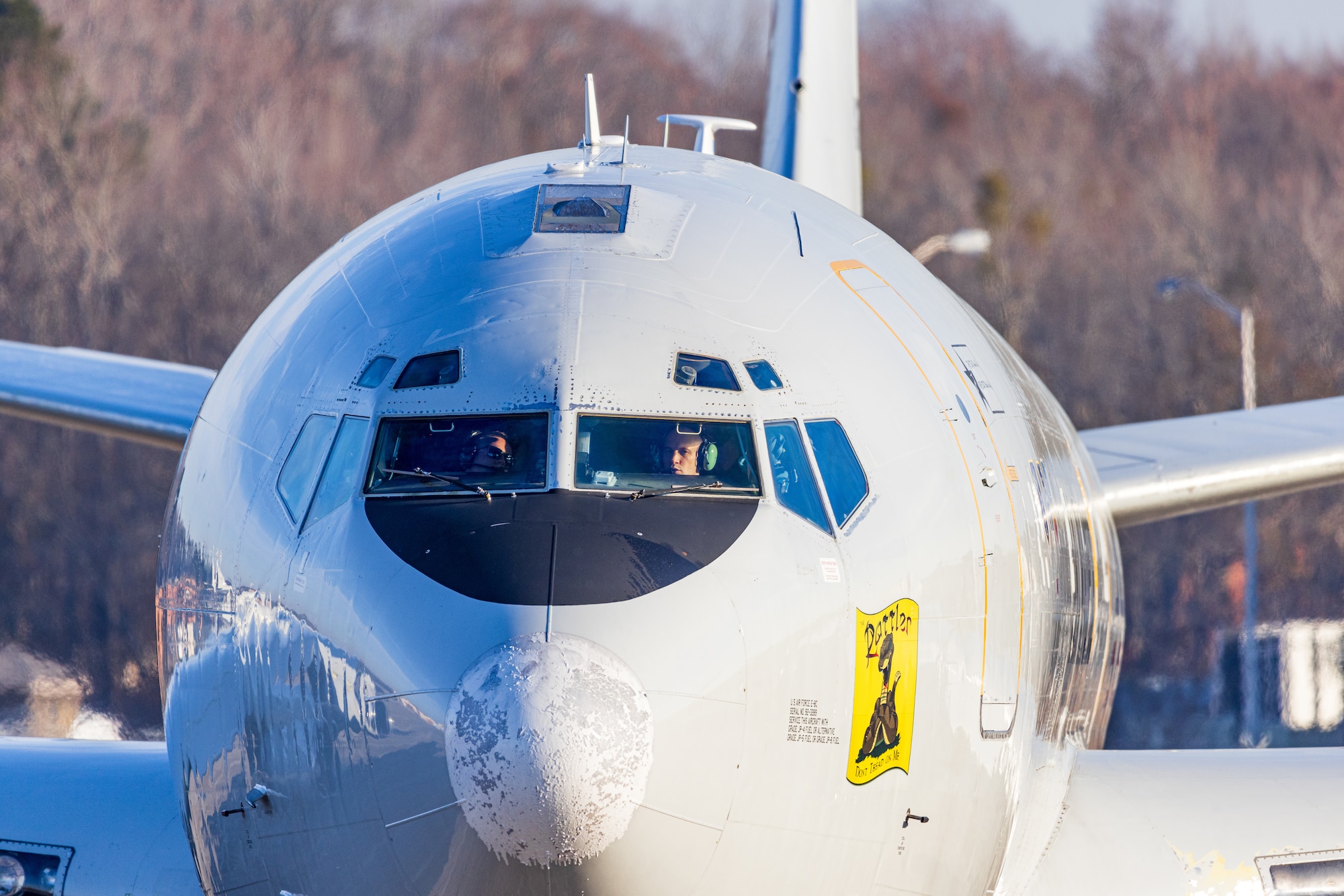 Photo shows a plane's nose and into its cockpit.