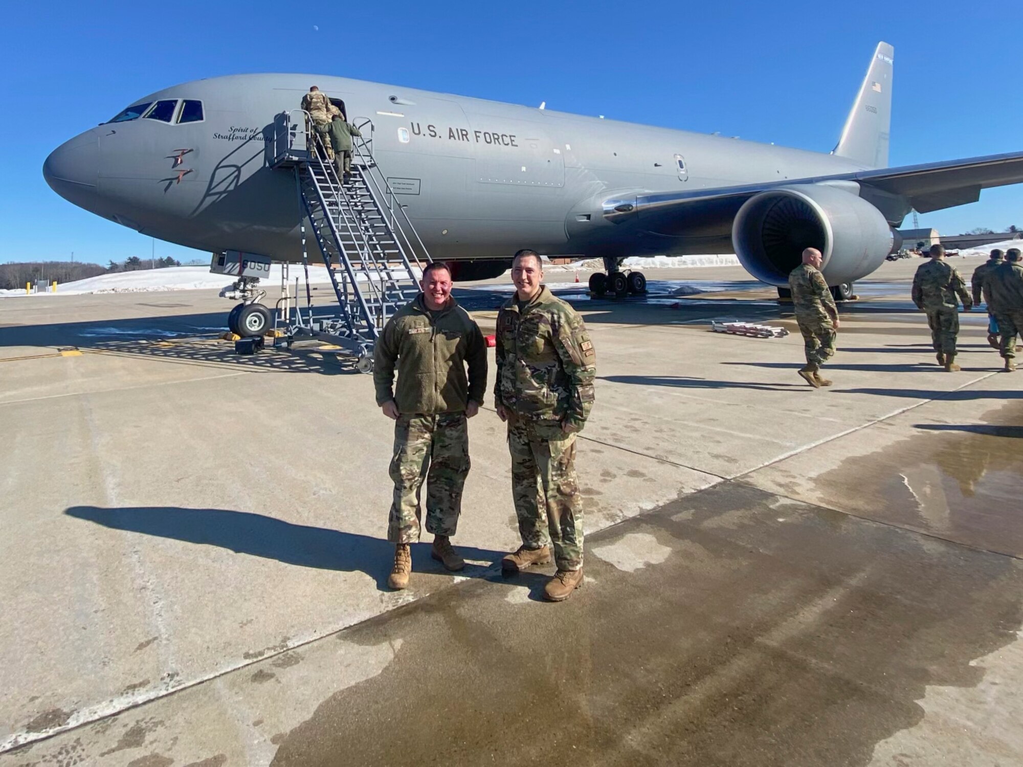 New Jersey State Command Chief Master Sgt. Michael Rakauckas, right, and Senior Master Sgt. Scott Cupples, 108th Wing 1st Sgt., left, visit a KC-46A Pegasus at Pease Air National Guard Base, New Hampshire during the Region 1 Enlisted Field Advisory Council.
