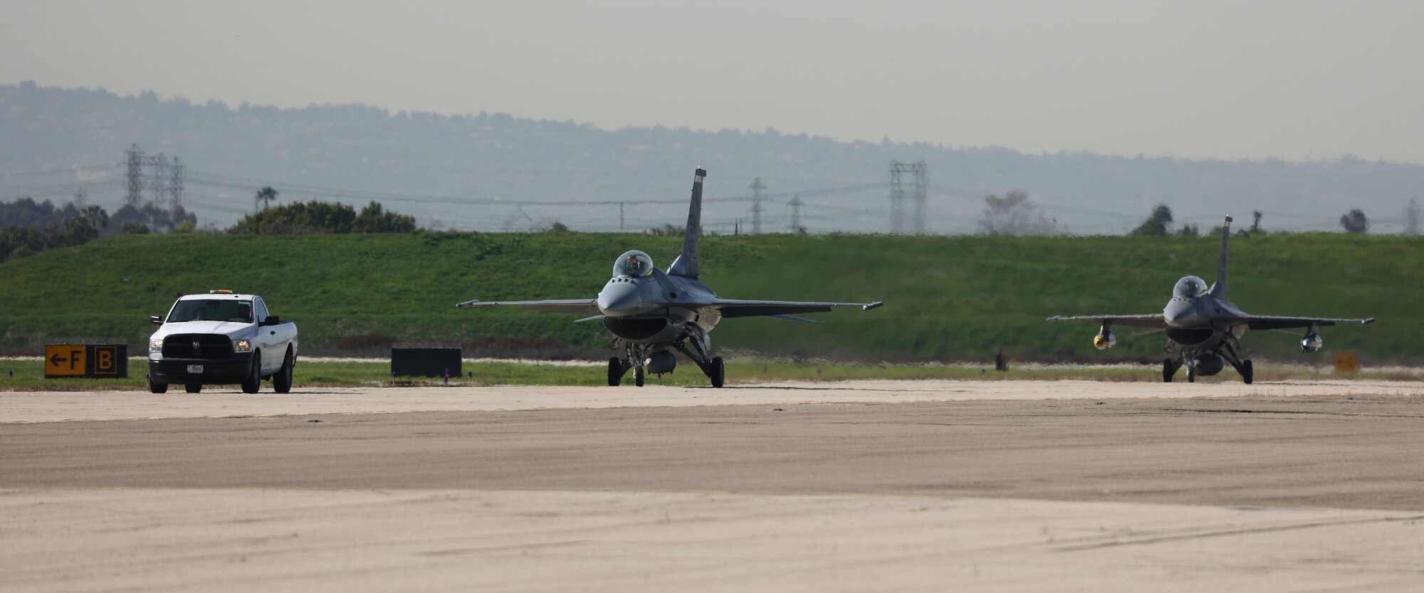 A U.S. Air Force A-10C Warthog II from the A-10C Thunderbolt II Demonstration Team, lands on Los Alamitos Army Airfield, Feb. 8, 2022, at Joint Forces Training Base, Los Alamitos, California. Five aircraft representing the Air Force’s 75 years as a service will perform a first-of-its-kind flyover of Super Bowl LVI in nearby Inglewood. Flyover aircraft are staging at the California National Guard base in the days leading up to the game. (U.S. Air National Guard photo by Staff Sgt. Crystal Housman)