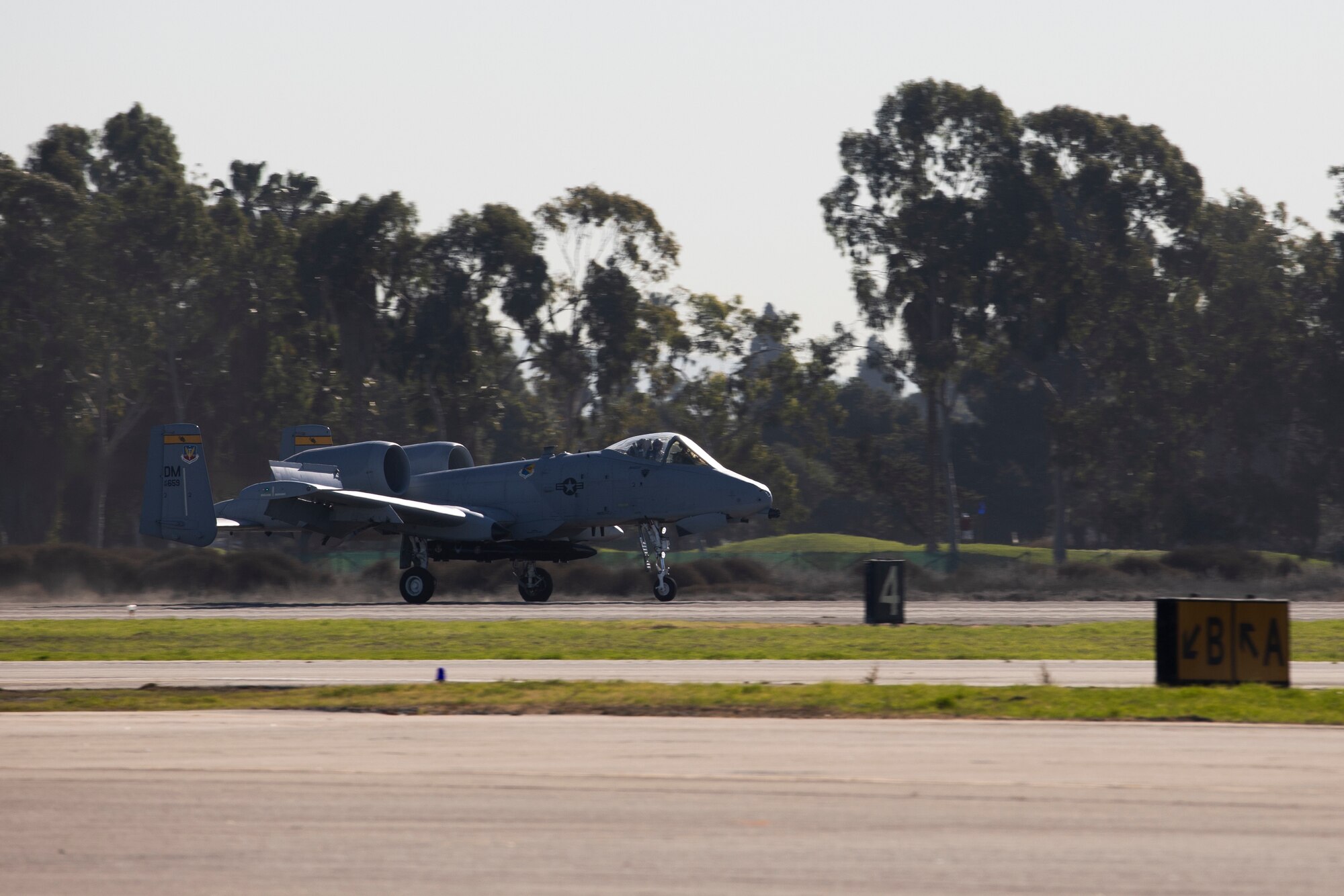 A U.S. Air Force A-10C Warthog II from the A-10C Thunderbolt II Demonstration Team, lands on Los Alamitos Army Airfield, Feb. 8, 2022, at Joint Forces Training Base, Los Alamitos, California. Five aircraft representing the Air Force’s 75 years as a service will perform a first-of-its-kind flyover of Super Bowl LVI in nearby Inglewood. Flyover aircraft are staging at the California National Guard base in the days leading up to the game. (U.S. Air National Guard photo by Staff Sgt. Crystal Housman)