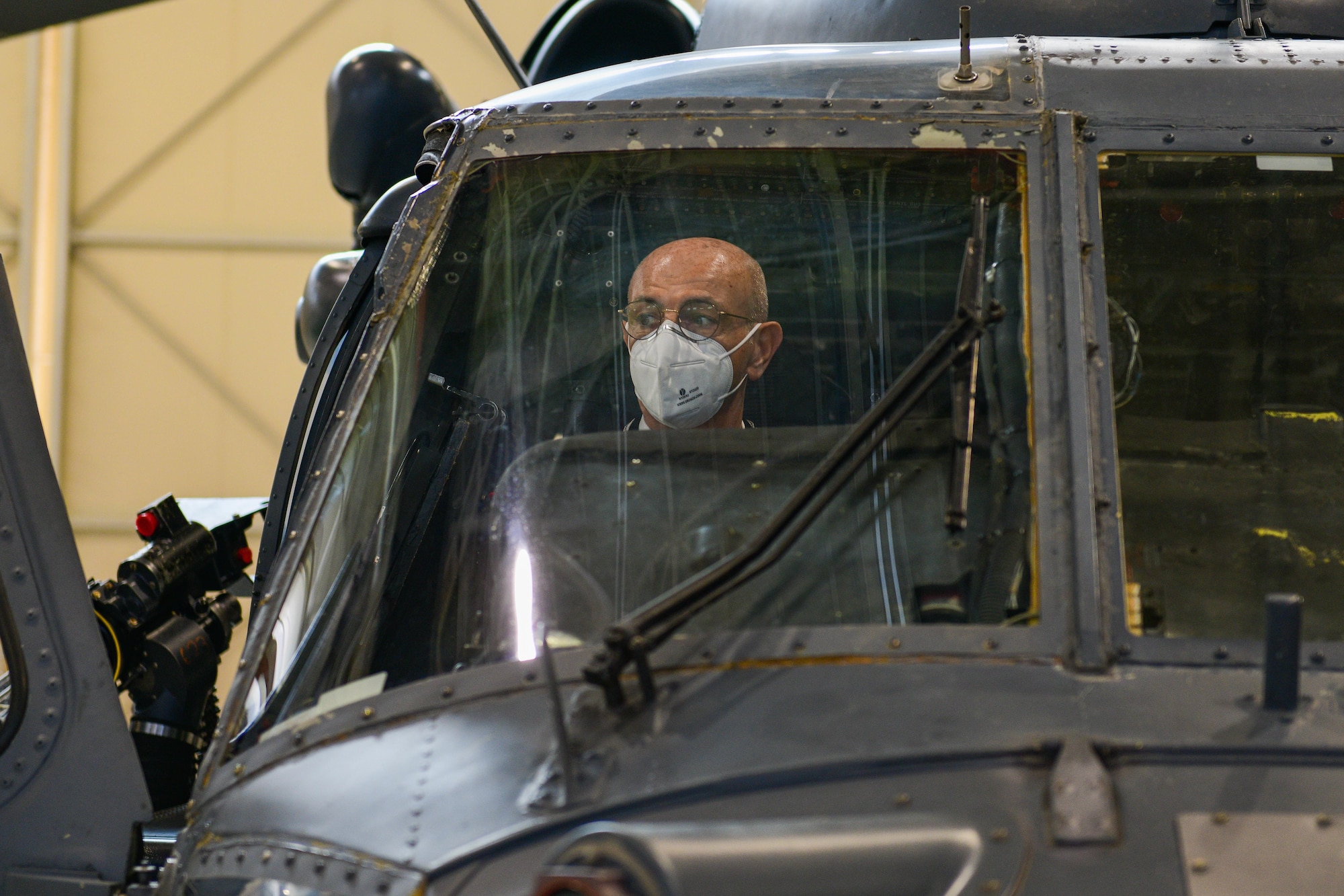 Brig. Gen. Francesco Atzeni, Friuli Venezia Giulia Carabinieri commander, sits in an HH-60G Pave Hawk assigned to the 56th Rescue Squadron at Aviano Air Base, Italy, Feb. 11, 2022. Atzeni is a helicopter pilot; his previous assignment was in Pratica di Mare (Rome) where he was the commander of the Carabinieri's Aircraft Regiment (RAC) and two Helicopter Units. The RAC’s operational activity is connected to Territorial and Special Units of the Corp and consists of patrols, support and rescue missions. (U.S. Air Force photo by Senior Airman Brooke Moeder)