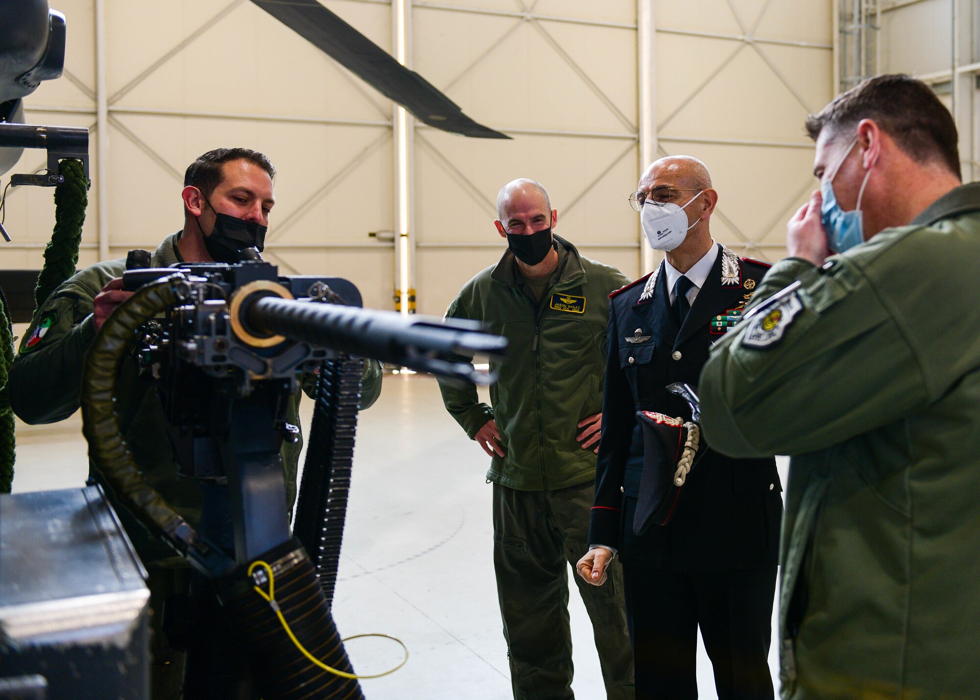 U.S. Air Force members assigned to the 56th Rescue Squadron show Brig. Gen. Francesco Atzeni, Friuli Venezia Giulia Carabinieri commander, an HH-60G Pave Hawk at Aviano Air Base, Italy, Feb. 11, 2022. During the visit, Atzeni toured the 56th Rescue Squadron and the Air Control Tower. These visits build relationships and strengthen trusted partnerships between Italy and the United States. (U.S. Air Force photo by Senior Airman Brooke Moeder)