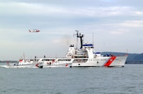 CAPE DISAPPOINTMENT, Wash. (Feb. 13, 2003)--The 52-foot motor lifeboats Intrepid and Triumph II escort the Coast Guard Cutter Steadfast during its return to port. Feb. 13, 2003. USCG photo by PA3 Kurt Fredrickson