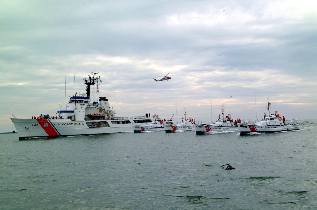 CAPE DISAPPOINTMENT, Wash. (Feb. 13, 2003)--The Coast Guard cutter Steadfast is escorted by the four remaining 52-foot motor lifeboats, Intrepid, Invincible II, Triumph II and Victory near Station Cape Disappointment, WA. Feb. 13, 2003. USCG photo by PA3 Kurt Fredrickson