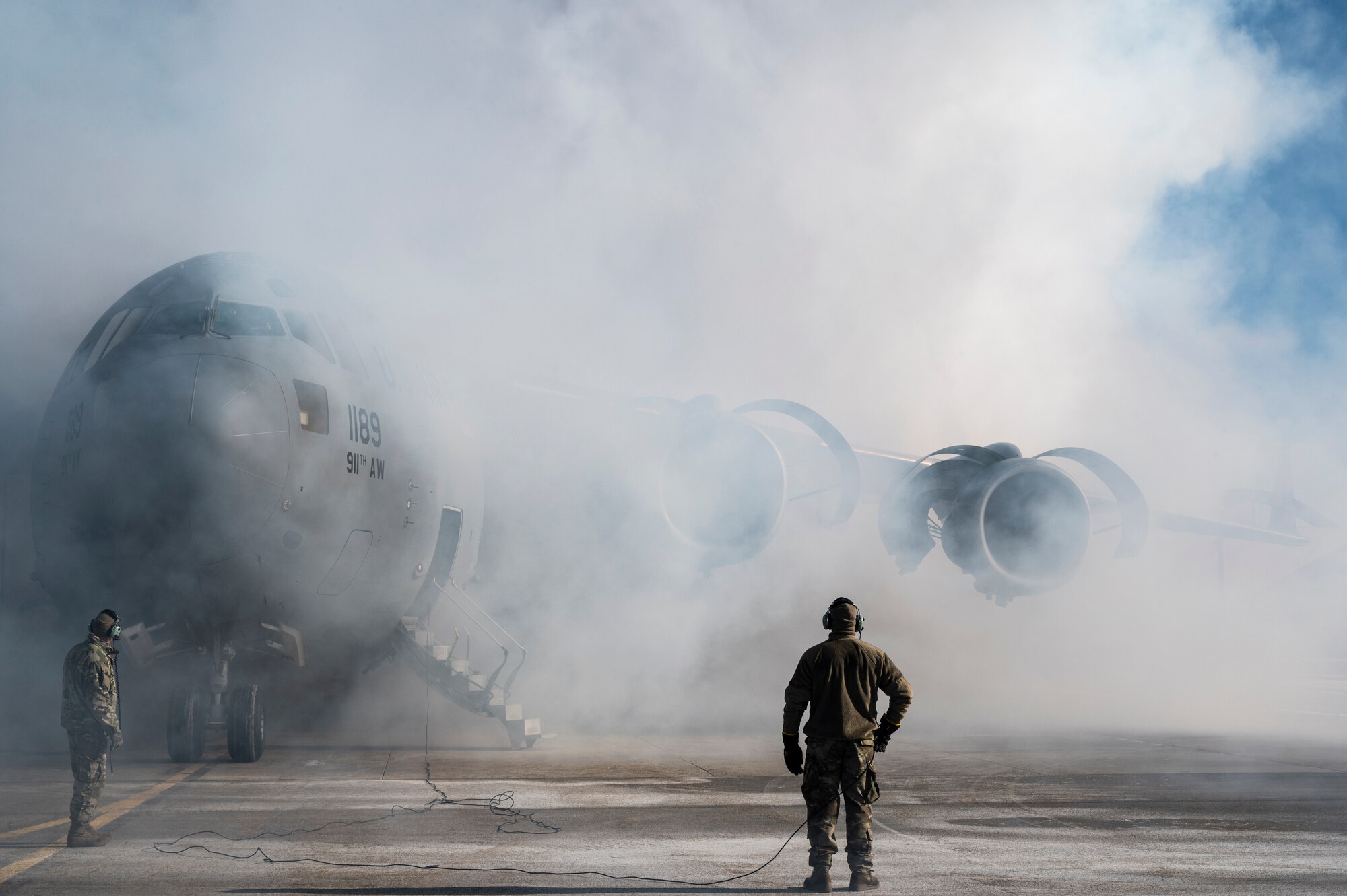 Airmen assigned to the 911th Maintenance Group conduct an engine depreservation run on a C-17 Globemaster III at the Pittsburgh International Airport Air Reserve Station, Pennsylvania, Jan. 21, 2022.