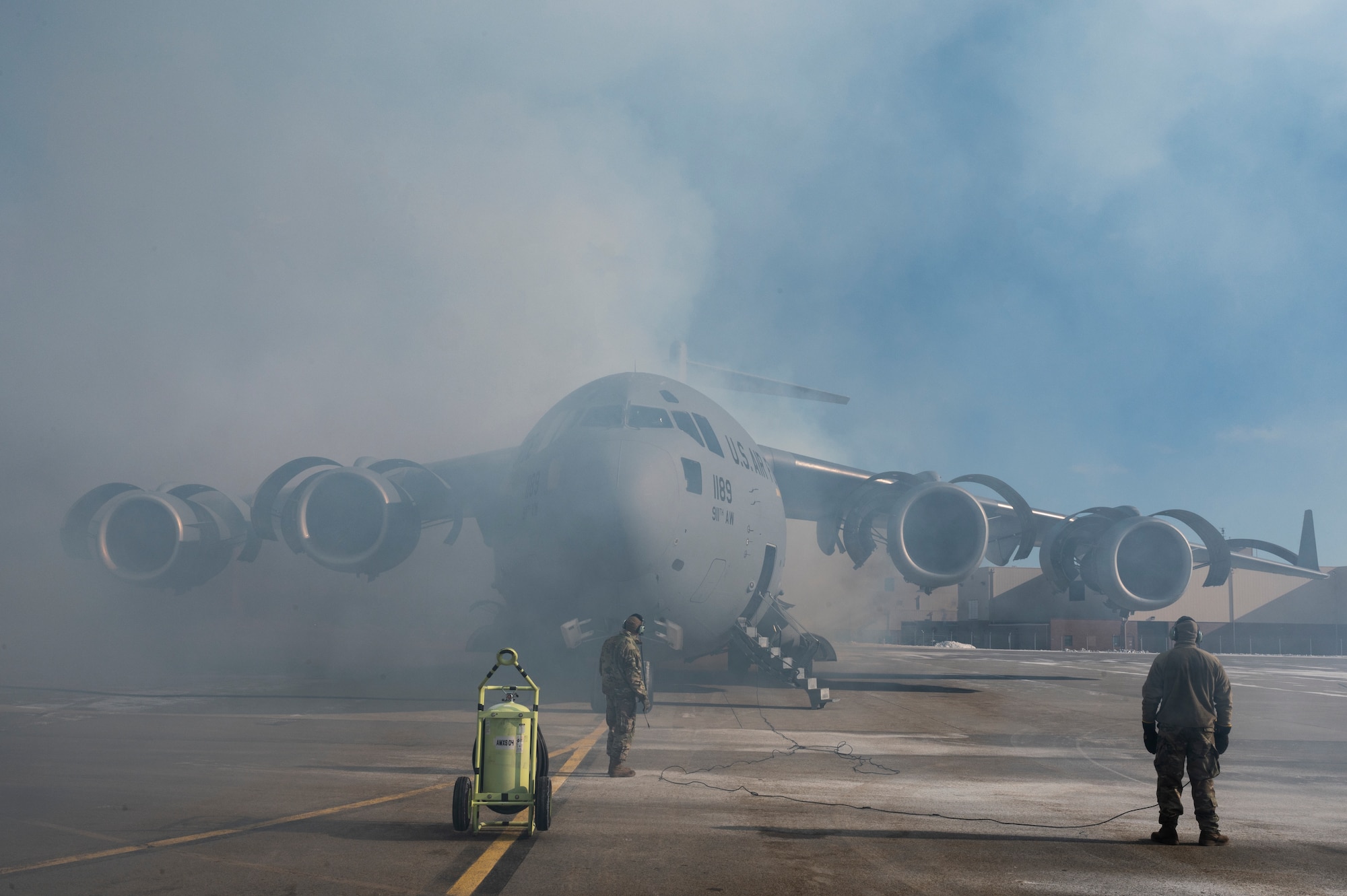 Airmen assigned to the 911th Maintenance Group conduct an engine depreservation run on a C-17 Globemaster III at the Pittsburgh International Airport Air Reserve Station, Pennsylvania, Jan. 21, 2022.