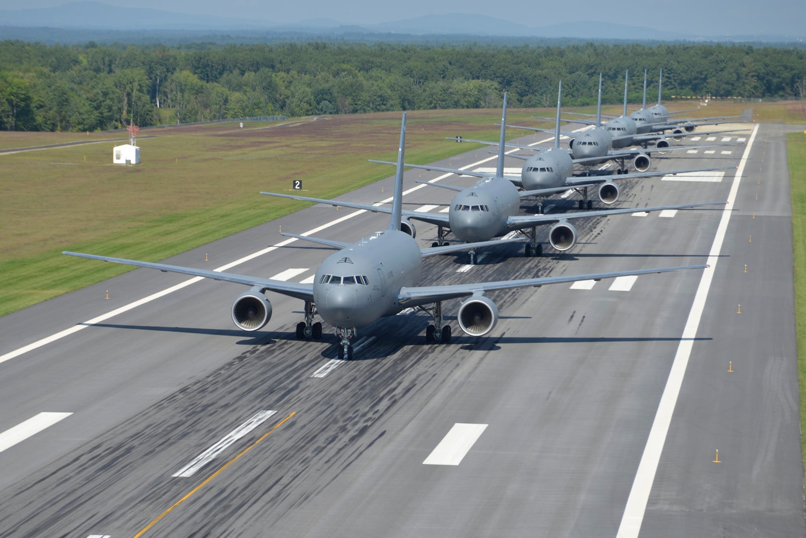 KC-46A aircraft assigned to the 157th Air Refueling Wing perform an elephant walk formation on the runway at Pease Air National Guard Base, Sept. 8, 2021.