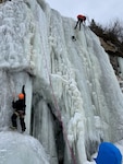 Ice climbers train at Pictured Rocks National Lakeshore, near Munising, Mich., in preparation for Michigan Ice Fest the week of Feb. 9-13, 2022. Coast Guard members from Air Station Traverse City and Station Marquette train closely with National Park Service rangers and volunteers to hone their skills. Photo courtesy Chief Ranger Joseph Hughes, Pictured Rocks National Lakeshore.