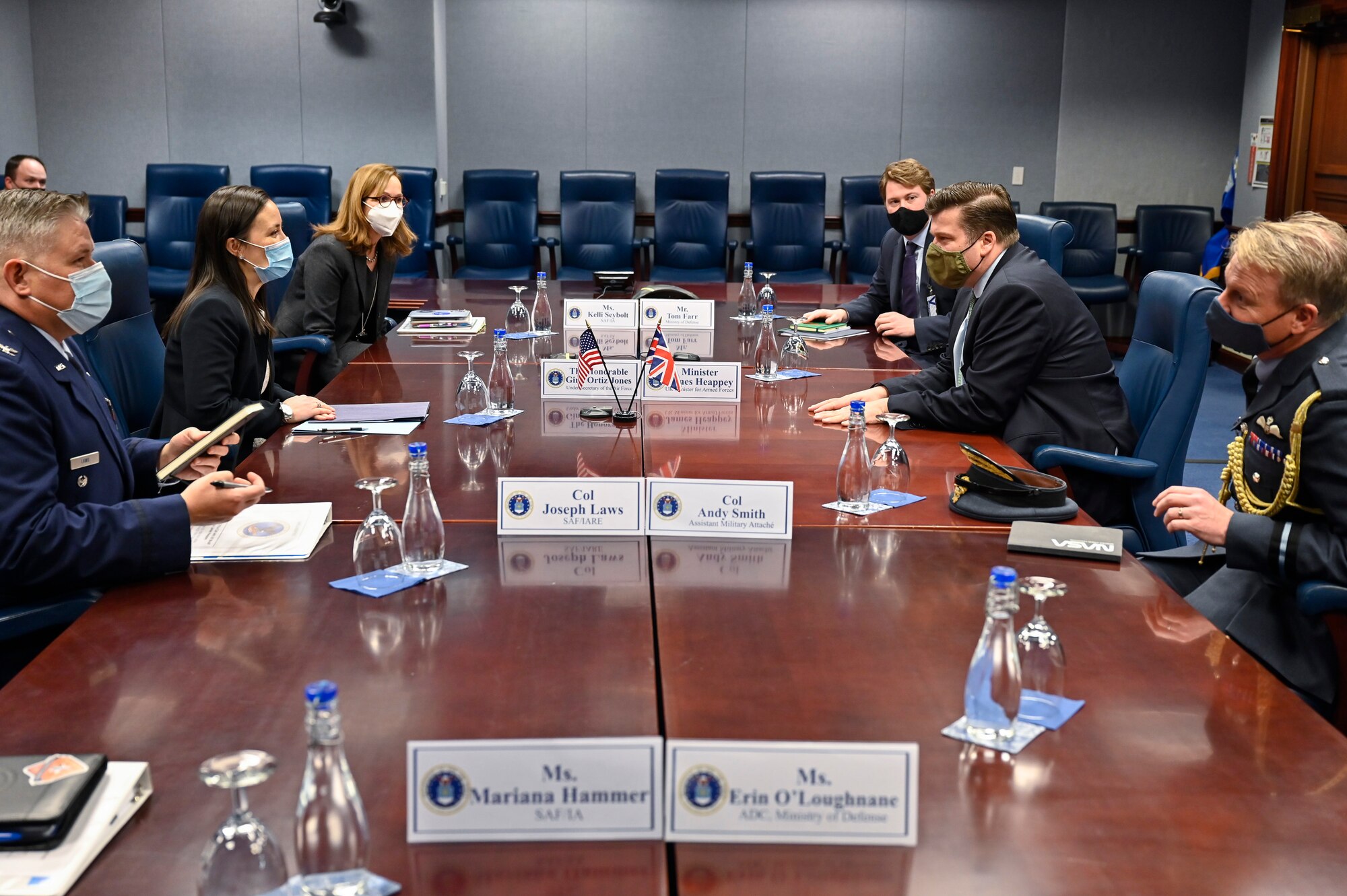 Under Secretary of the Air Force Gina Ortiz Jones, center left, speaks with Minister James Heappey, parliamentary under secretary of state for the armed forces of the United Kingdom, during a meeting at the Pentagon.