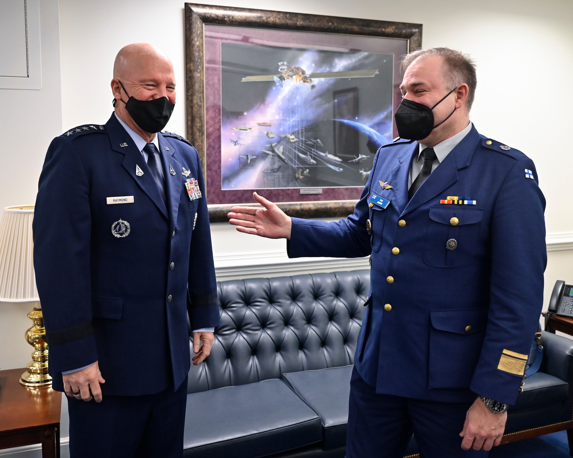 Maj. Gen. Pasi Jokinen, right, commander of the Finnish Air Force, speaks with Chief of Space Operations Gen. John W. “Jay” Raymond.