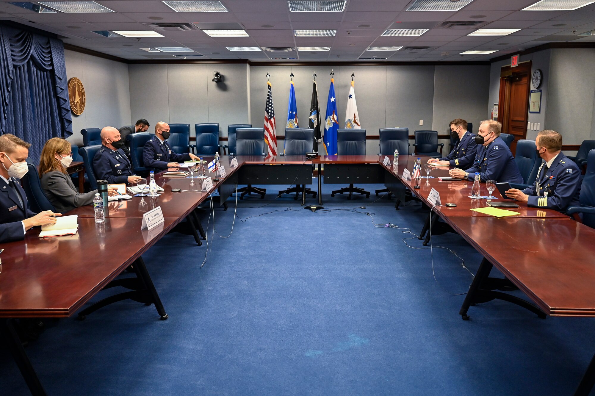 Chief of Space Operations Gen. John W. “Jay” Raymond, third from left, speaks with Maj. Gen. Pasi Jokinen, second from right.