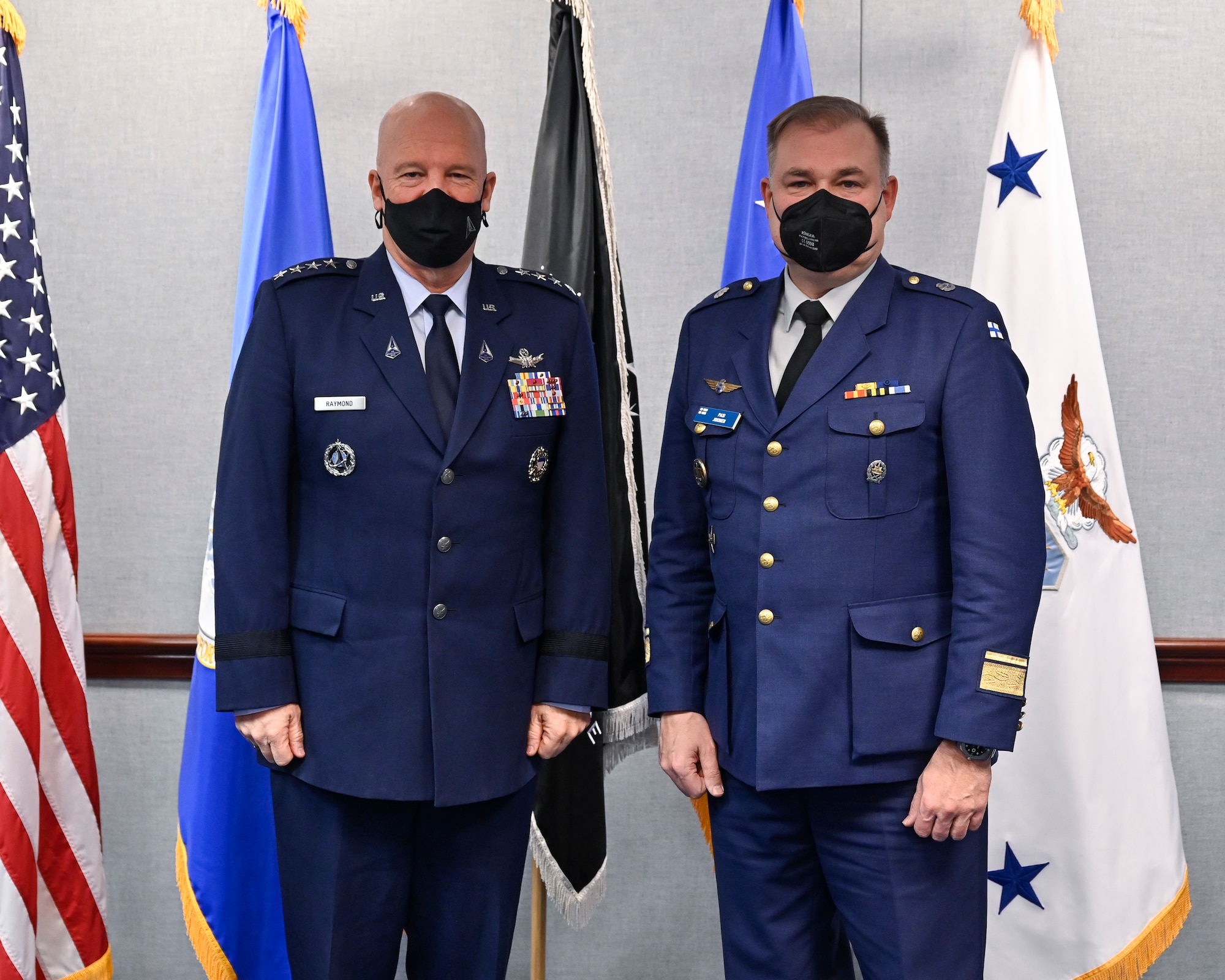 Chief of Space Operations Gen. John W. “Jay” Raymond, left, poses with Maj. Gen. Pasi Jokinen.