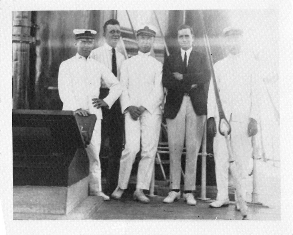 Officers with unidentified guest aboard USLHT Kukui, no date.