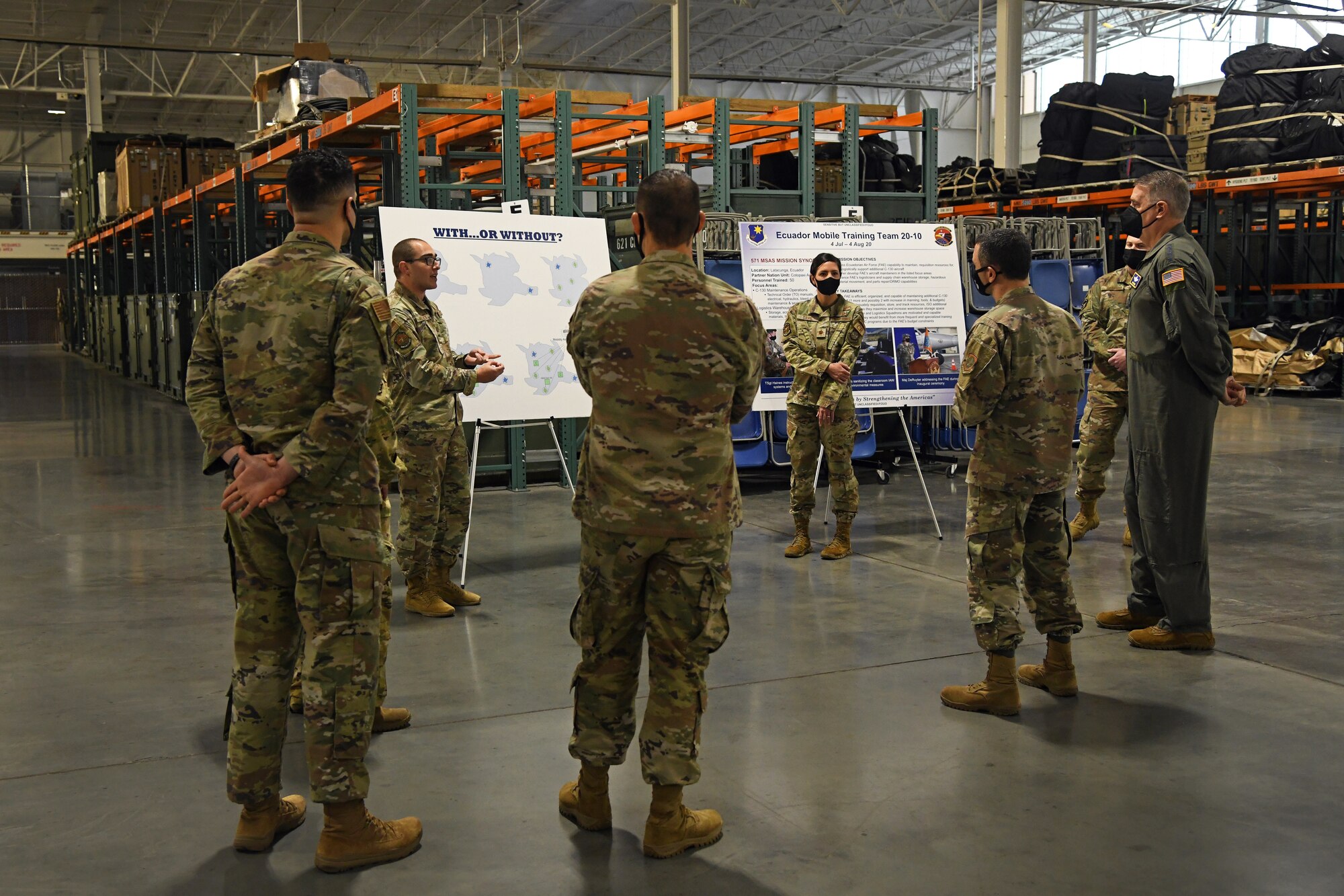 U.S. Air Force Capt. Phillip Resnick, 571st Mobility Support Advisory Squadron air advisor and mission commander, briefs the command team of Air Mobility Command about the strategic vision of future air advisor employment Feb. 11, 2022, at Travis Air Force Base, California. The command team got an overview of the 621st Air Mobility Advisory Group and the 821st Contingency Response Group missions during their visit to the base. (U.S. Air Force photo by Master Sgt. Melissa B. White)