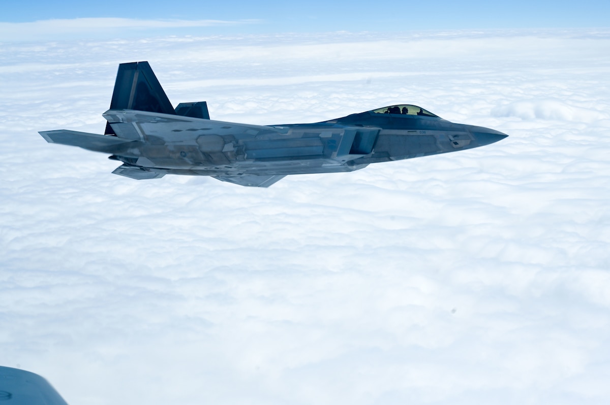 Jet flies by a jet