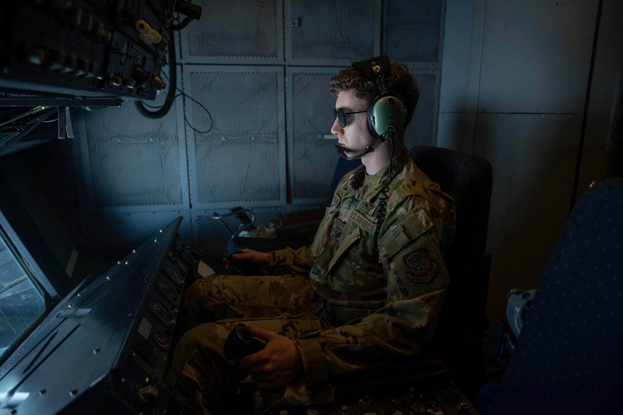 Senior Airman Daniel Proben, 9th Air Refueling Squadron boom operator, refuels F-15E Strike Eagles assigned to the 144th Fighter Wing, so they can provide security for Super Bowl LVI Feb. 13, 2022, above Los Angeles. A KC-10 Extender provides 83,000 pounds of fuel to three F-15E Strike Eagles over the course of Super Bowl LVI, so they can provide security. (U.S. Air Force photo by Senior Airman Cameron Otte)