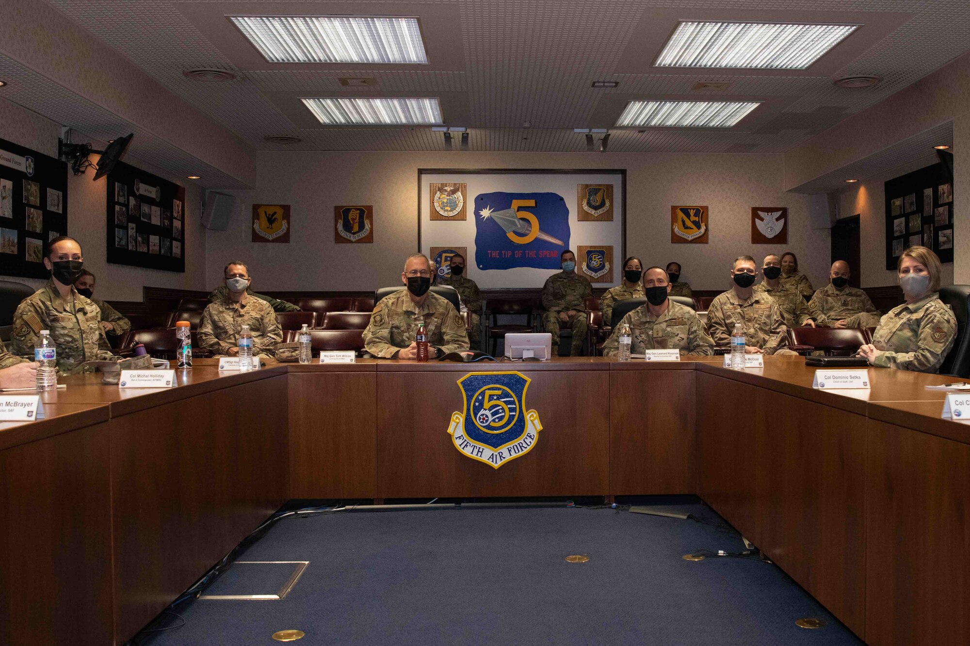 Maj. Gen. Tom Wilcox, center left, Air Force Installation and Mission Support Center commander, meets with Fifth Air Force leadership during a site visit at Yokota Air Base, Japan, Feb. 9, 2022.