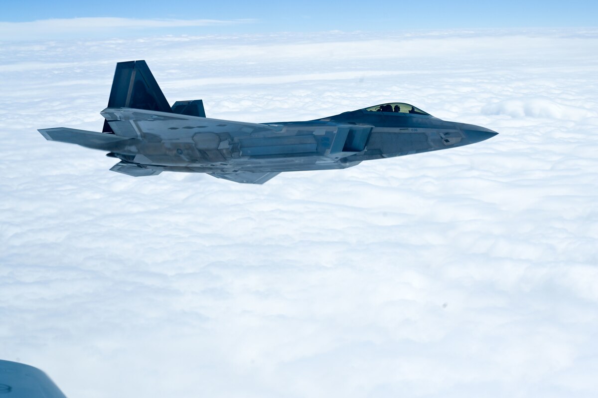 Jet flies by a jet