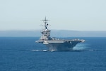 USS Carl Vinson (CVN 70) prepares to steam alongside USS Nimitz (CVN 68). Nimitz is currently underway preparing for future operations.