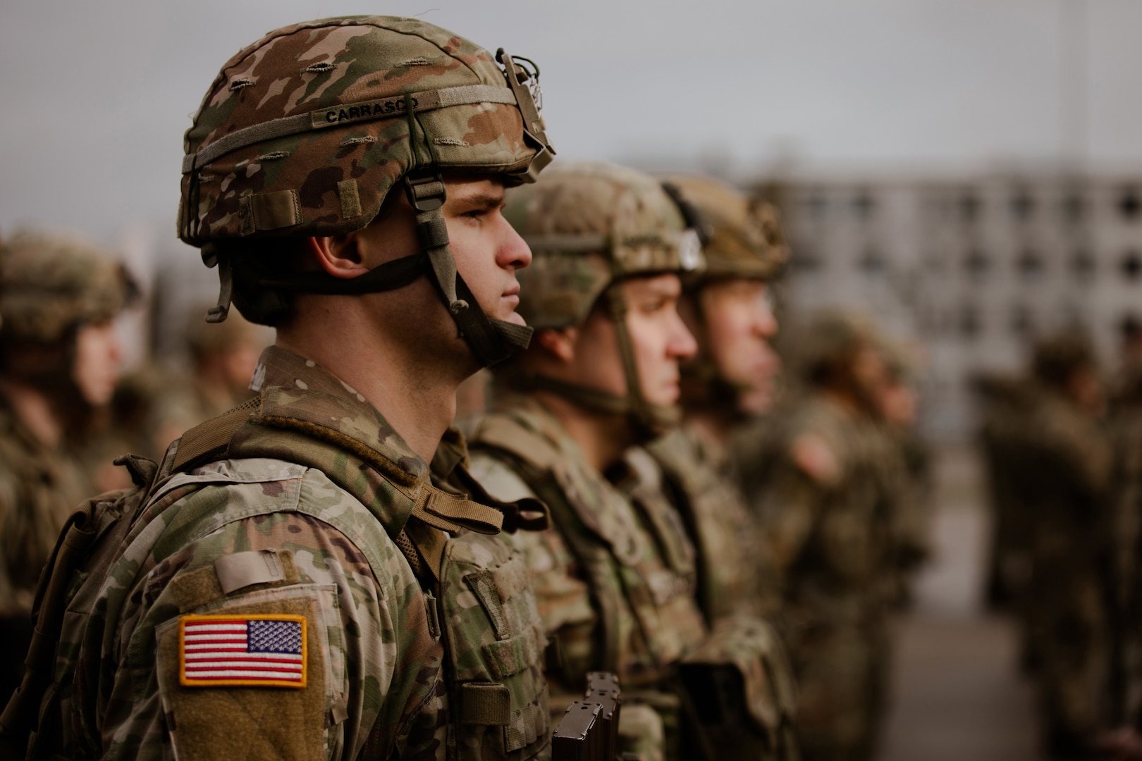 U.S. Army National Guard Soldiers assigned to 3rd Battalion, 161st Infantry Regiment, stand in formation during a handover/takeover ceremony at Bemowo Piskie Training Area, Poland, Feb. 11, 2022. The ceremony demonstrated NATO's continued commitment to the collective defense and security of our allies on NATO's eastern flank.