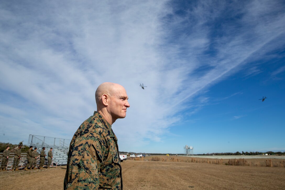 U.S. Marine Corps Sgt. Maj. Troy E. Black, the 19th Sergeant Major of the Marine Corps, observes a forward area refueling point demonstration at Marine Corps Air Station Cherry Point, North Carolina, Jan. 13, 2022. The demonstration was part of a three-day Sergeant Major of the Marine Corps Force Level Summit. The summits are held quarterly to support force level sergeants major at their respective commands. (U.S. Marine Corps photo by Sgt. Victoria Ross)