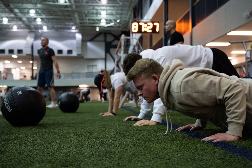 Airmen assigned to the 354th Fighter Wing participate in a workout during Pro Blitz Alaska on Eielson Air Force Base, Alaska, Feb. 11, 2022.