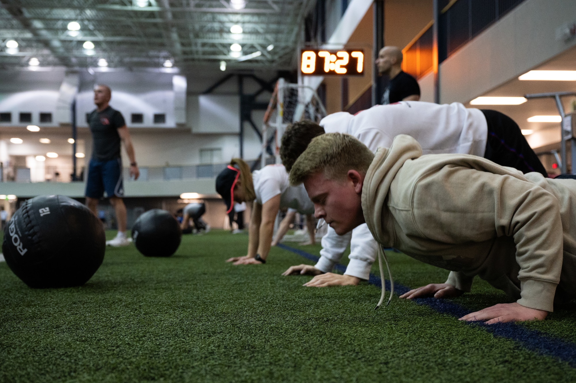 Airmen assigned to the 354th Fighter Wing participate in a workout during Pro Blitz Alaska on Eielson Air Force Base, Alaska, Feb. 11, 2022.