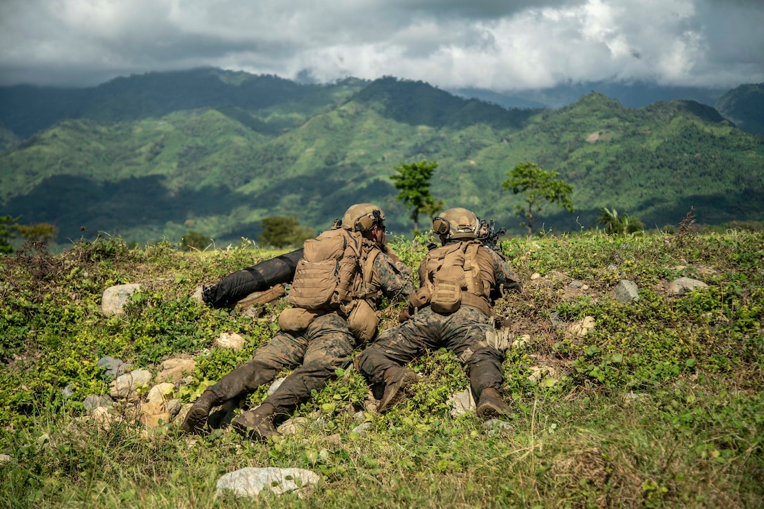 U.S. Marine Corps Lance Cpl. Cesar Villa, left, a native of Fresco, TX, and Lance Cpl. Jerin Falasco, a native of Centennial, Colo., both machine gunners assigned to Charlie Company, Battalion Landing Team, 1/1, 11th Marine Expeditionary Unit (MEU), set security with an M240B machine gun during an amphibious assault demonstration in support of Marine Exercise Philippines (MAREX 22 PH) at Brooke’s Point, Philippines, Jan. 31, 2022. MAREX 22 PH demonstrates U.S. commitment to the region and our long-standing treaty allies. We seek to build enduring, mutually beneficial relationships and invest in training to ensure a Free and Open Indo-Pacific.
