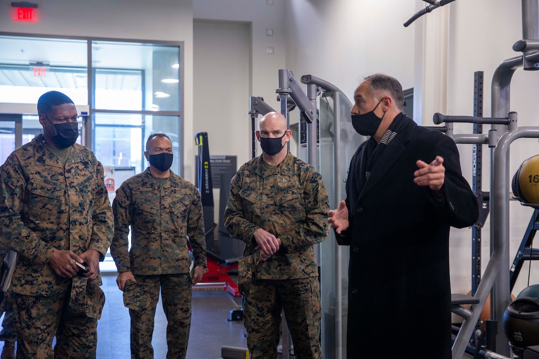 U.S. Marine Corps Sgt. Maj. Troy E. Black, the 19th Sergeant Major of the Marine Corps, and force level sergeants major listen to a human performance brief by Mr. William Getsy at the Marine Forces Special Operations Command Stone Bay Fitness Center, at Camp Lejeune, North Carolina, Jan. 11, 2022. The brief was part of a three-day Sergeant Major of the Marine Corps Force Level Summit. The summits are held quarterly to support force level sergeants major at their respective commands. (U.S. Marine Corps photo by Sgt. Victoria Ross)