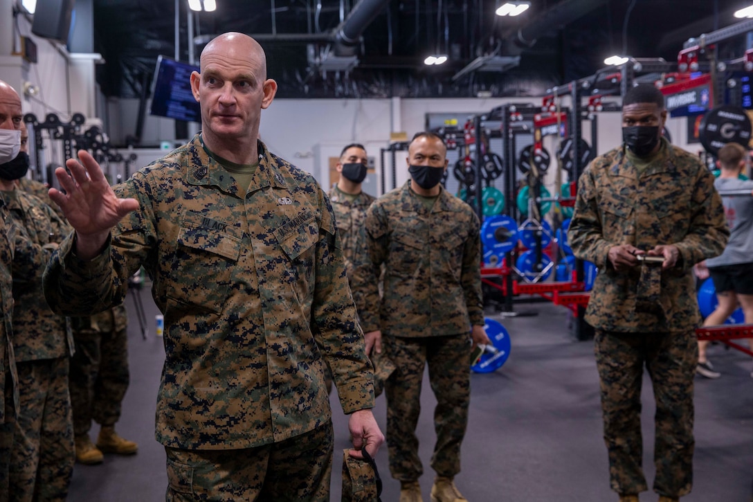 U.S. Marine Corps Sgt. Maj. Troy E. Black, the 19th Sergeant Major of the Marine Corps, speaks to force level sergeants major during a tour of the Marine Forces Special Operations Command Stone Bay Fitness Center, at Camp Lejeune, North Carolina, Jan. 11, 2022. The brief was part of a three-day Sergeant Major of the Marine Corps Force Level Summit. The summits are held quarterly to support force level sergeants major at their respective commands. (U.S. Marine Corps photo by Sgt. Victoria Ross)