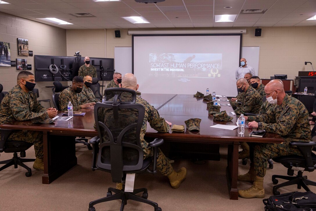 U.S. Marine Corps Sgt. Maj. Troy E. Black, the 19th Sergeant Major of the Marine Corps, and force level sergeants major receive a human performance brief at the School of Infantry-East, Camp Lejeune, North Carolina, Jan. 11, 2022. The brief was part of a three-day Sergeant Major of the Marine Corps Force Level Summit. The summits are held quarterly to support force level sergeants major at their respective commands. (U.S. Marine Corps photo by Sgt. Victoria Ross)