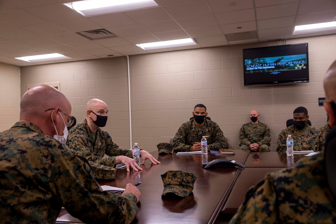U.S. Marine Corps Sgt. Maj. Troy E. Black, the 19th Sergeant Major of the Marine Corps, and force level sergeants major receive a human performance brief at the School of Infantry-East, Camp Lejeune, North Carolina, Jan. 11, 2022. The brief was part of a three-day Sergeant Major of the Marine Corps Force Level Summit. The summits are held quarterly to support force level sergeants major at their respective commands. (U.S. Marine Corps photo by Sgt. Victoria Ross)