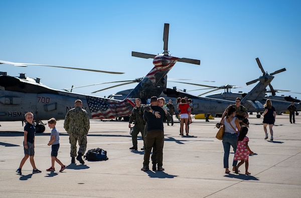 Family members welcome home Sailors attached to the “Blue Hawks” of Helicopter Maritime Strike Squadron (HSM) 78.