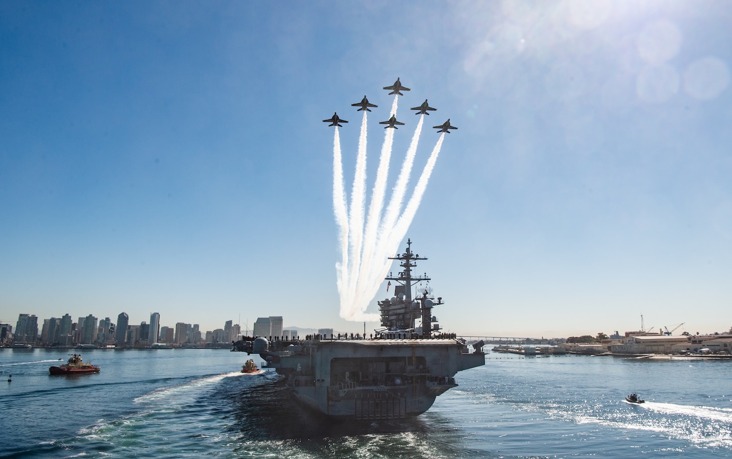 The U.S. Navy Flight Demonstration Squadron, the Blue Angels, fly in the Delta Formation over the aircraft carrier USS Carl Vinson (CVN 70) after returning from an eight-month deployment.