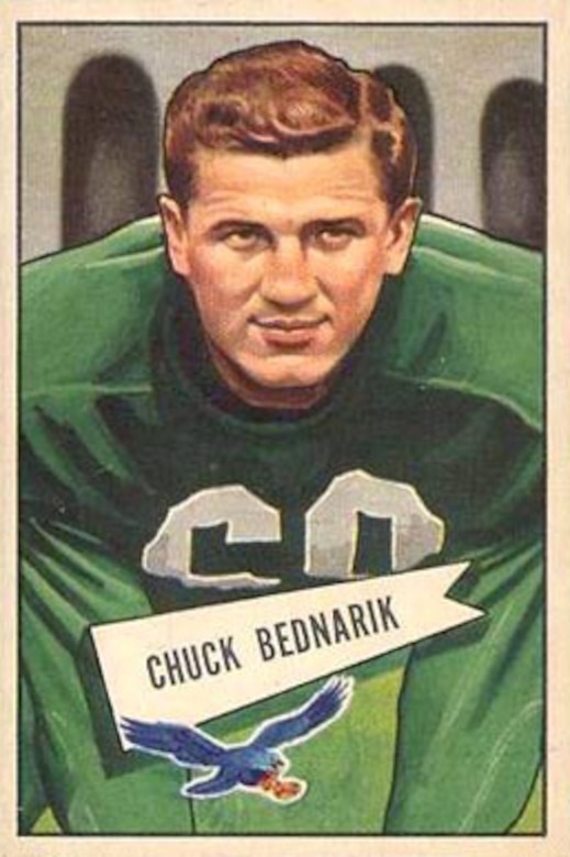 A football player is shown on a sports card.