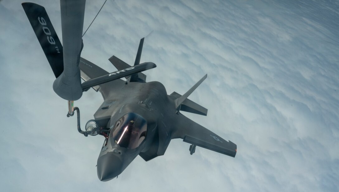 An F-35B Lightning II from the Marine Fighter Attack Squadron 121 gets refueled by a KC-135 Stratotanker from the 909th Air Refueling Squadron in support of Exercise Noble Fusion over the Pacific Ocean Feb. 4, 2022. Noble Fusion demonstrates that Navy and Marine Corps forward-deployed stand-in naval expeditionary forces can rapidly aggregate Marine Expeditionary Unit/Amphibious Ready Group teams at sea, along with a carrier strike group, joint forces and allies in order to conduct lethal sea-denial operations, seize key maritime terrain, guarantee freedom of movement, and create advantage for U.S., partner and allied forces. Naval Expeditionary forces conduct training in the Indo-Pacific throughout the year to maintain readiness. (U.S. Air Force photo by Airman 1st Class Moses Taylor)