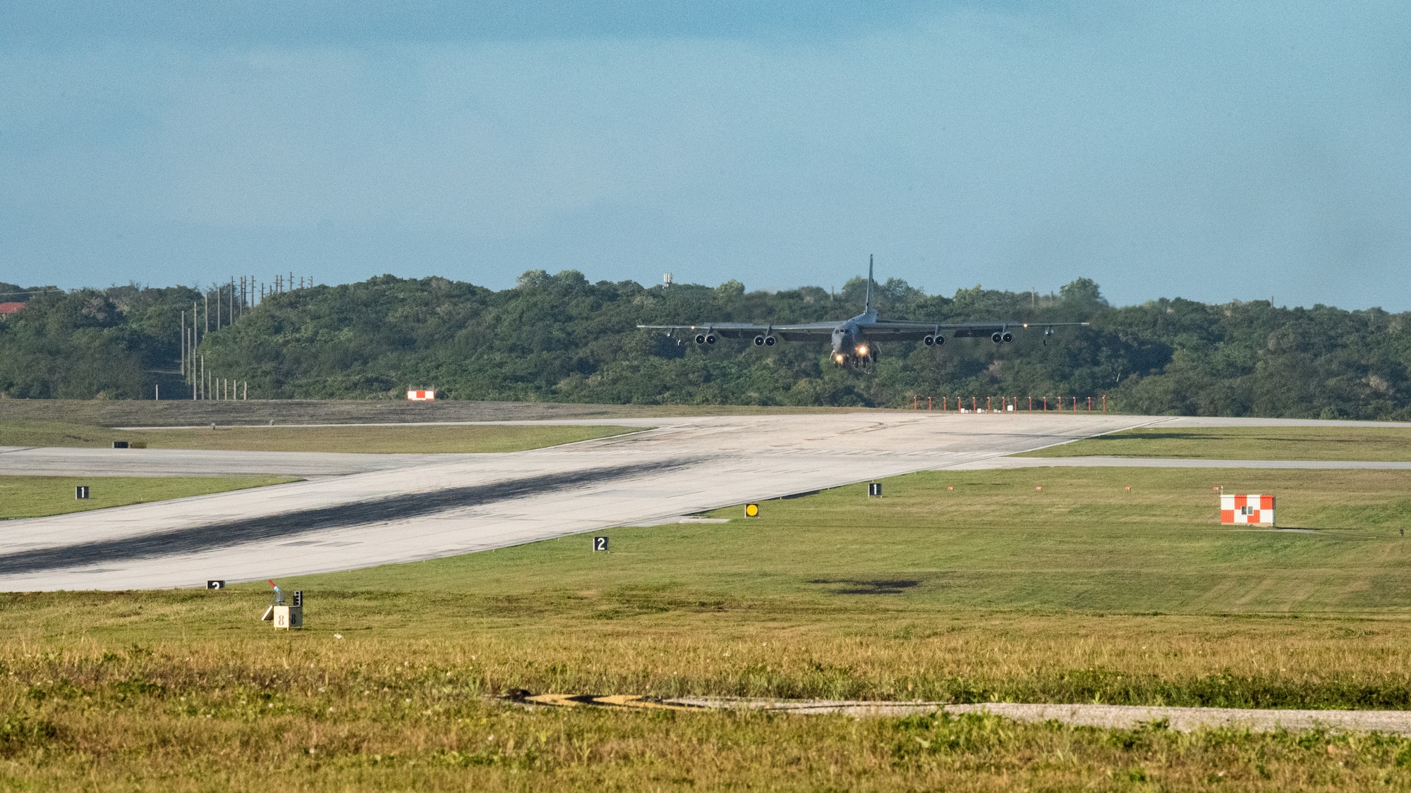 A B-52 Stratofortress from Barksdale Air Force Base, prepares to land on a flight line in support of a Bomber Task Force mission at Andersen Air Force Base, Guam, Feb. 9th, 2022. Bomber missions demonstrate the credibility of our forces to address a complex and uncertain security environment. (U.S. Air Force photo by Senior Airman Jonathan E. Ramos)