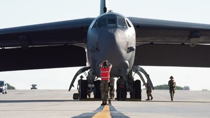 Airmen from the 2nd Maintenance Squadron prepare a B-52 Stratofortress for maintenance on the flight line in support of a Bomber Task Force deployment at Andersen Air Force Base, Guam, Feb. 9th, 2022. BTF missions are designed to showcase Pacific Air Forces’ ability to deter, deny, and dominate any influence or aggression from adversaries or competitors. (U.S. Air Force photo by Senior Airman Jonathan E. Ramos)