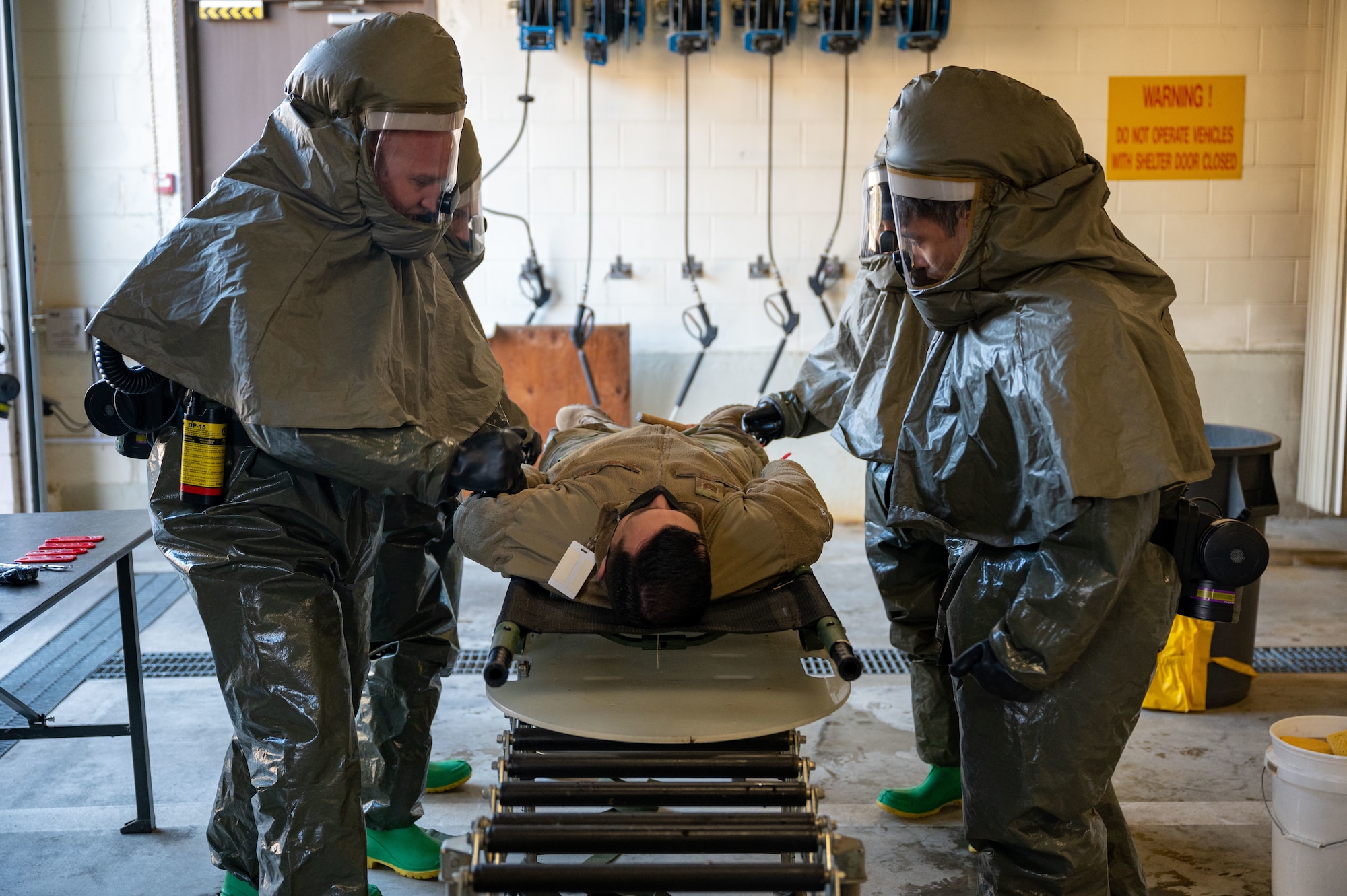 Decontamination training ensures the 8th MDG is ready and proficient at responding to potential Wolf Pack casualties.
