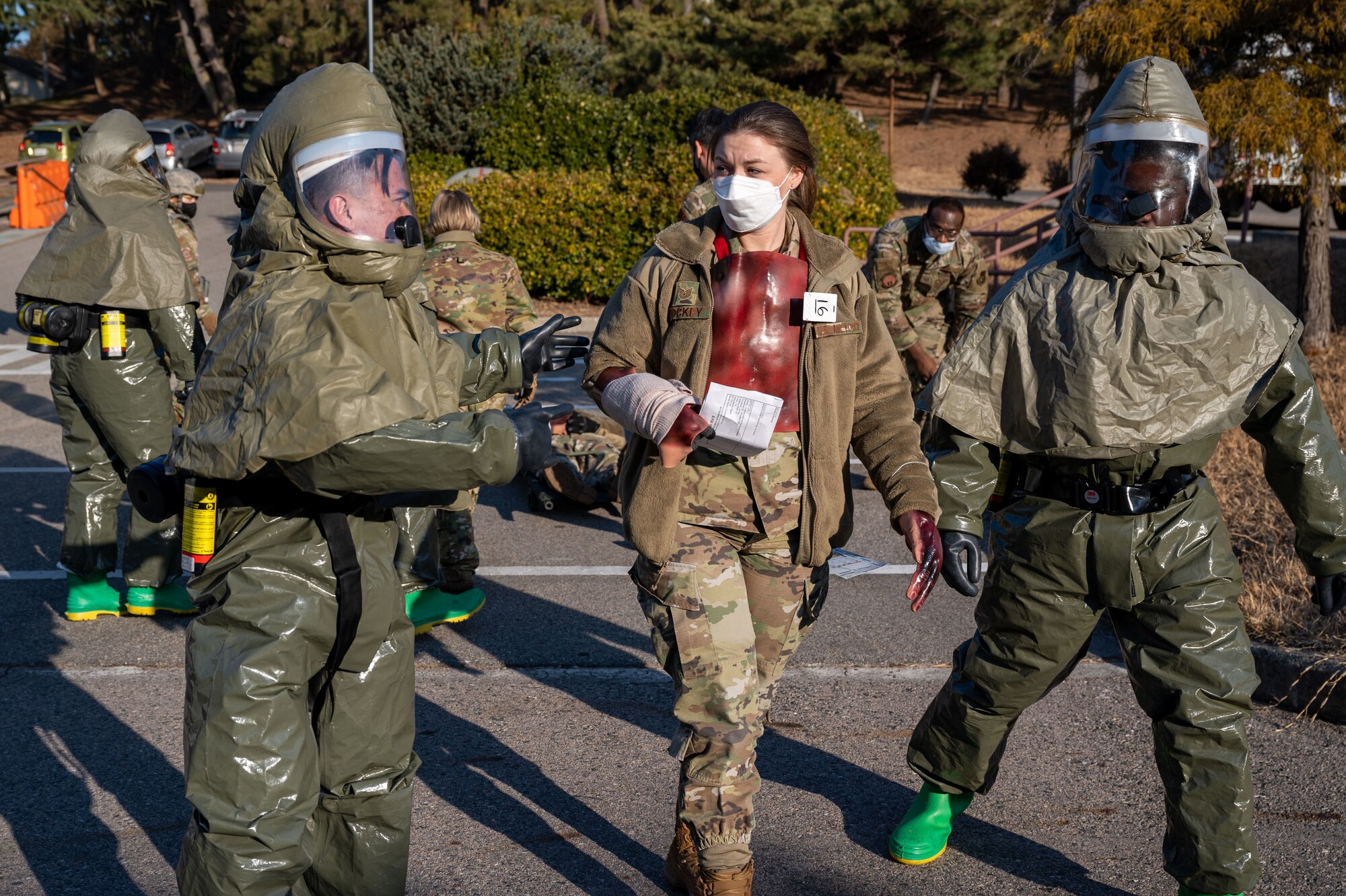 Decontamination training ensures the 8th MDG is ready and proficient at responding to potential Wolf Pack casualties.