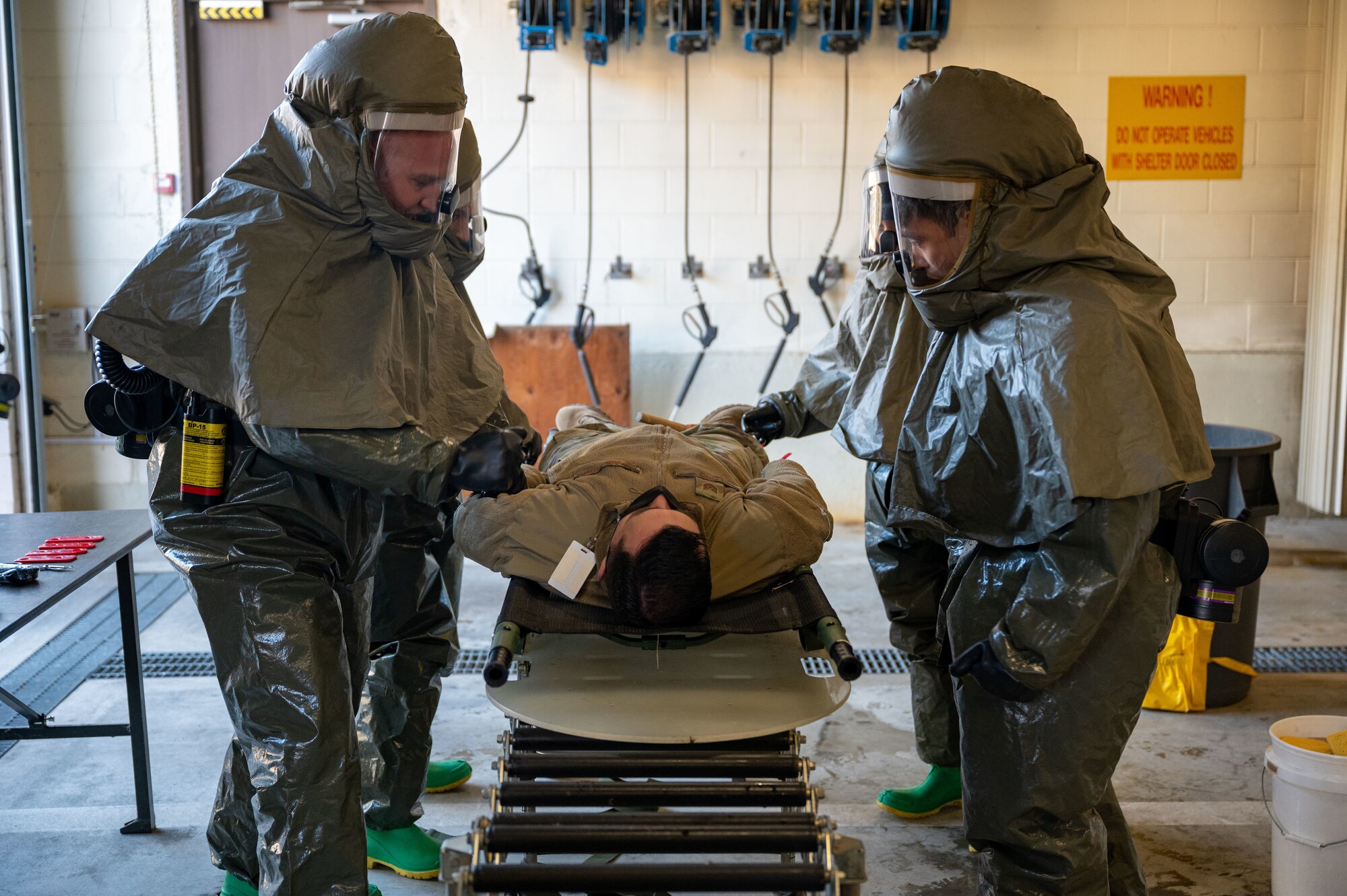 Decontamination training ensures the 8th MDG is ready and proficient at responding to potential Wolf Pack casualties.