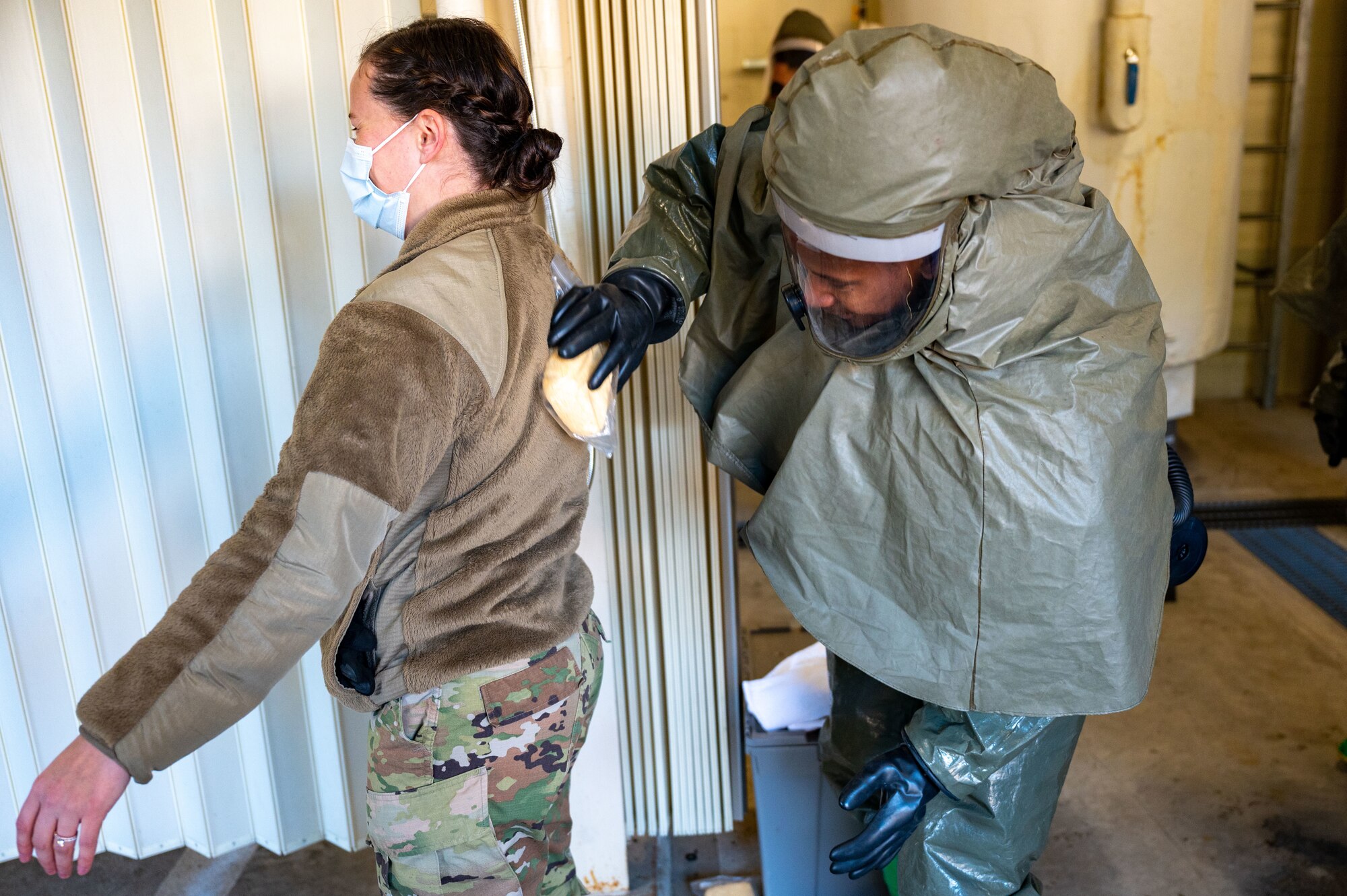 Decontamination training ensures the 8th MDG is ready and proficient at responding to potential Wolf Pack casualties.