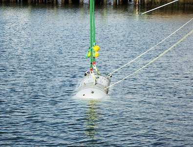 NUWC Division Newport, PEO team christen Snakehead UUV at Narragansett Bay Test Facility