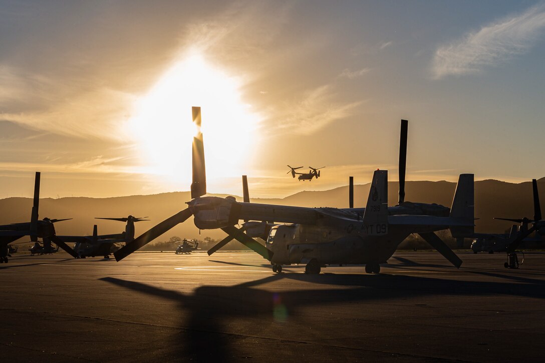 U.S. Marine MV-22B Ospreys standby and take off from Marine Corps Air Station Camp Pendleton, California, Feb. 8, 2022. The air station operates and maintains a secure airfield in order to support I Marine Expeditionary Force, Marine Corps Base Camp Pendleton tenant commands and visiting units to enhance their mission capabilities and combat readiness. (U.S. Marine Corps photo by Lance Cpl. Hope Straley)